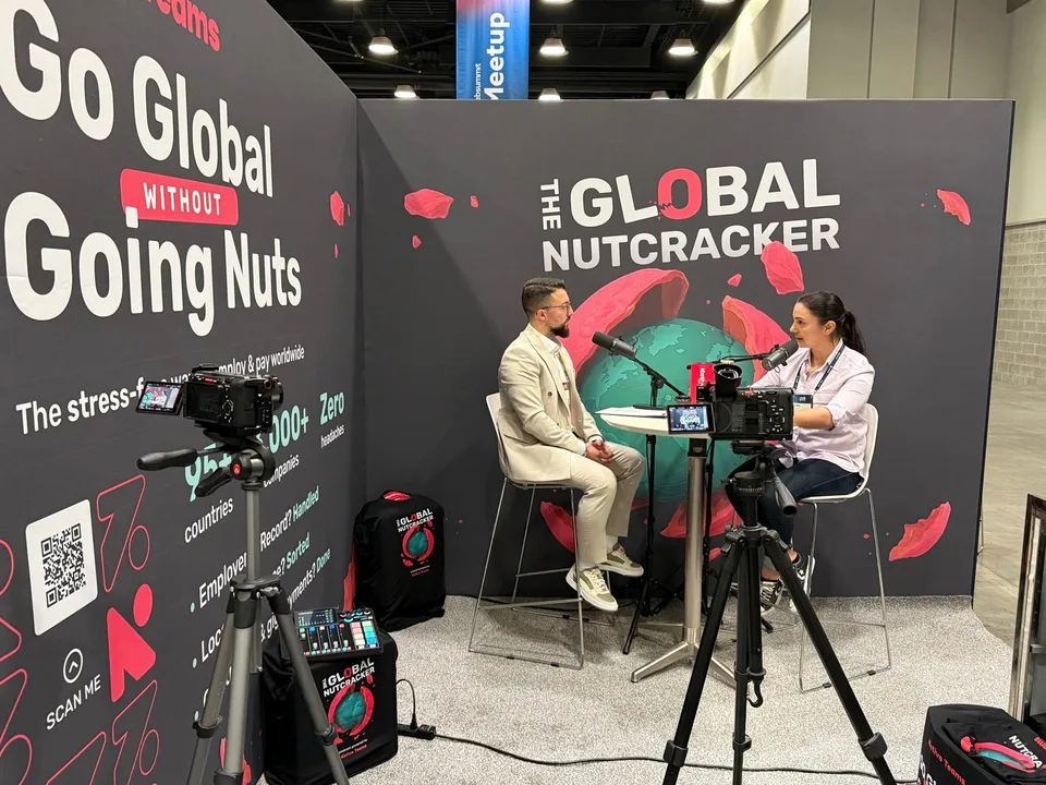 A two-camera interview station set up inside a booth at Web Summit