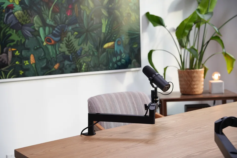 A Shure SM7B on its boom arm, set for an audio-only session